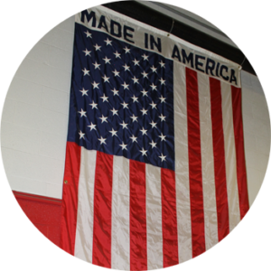 The American Flag hanging down with "Made in America" written above