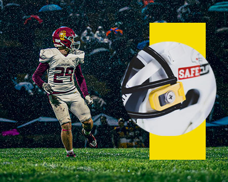 Football player in a white uniform running on a field at night, with a close-up overlay of a white helmet featuring the Mayfield Athletics S.A.F.E. Clip made with Sorbothane.