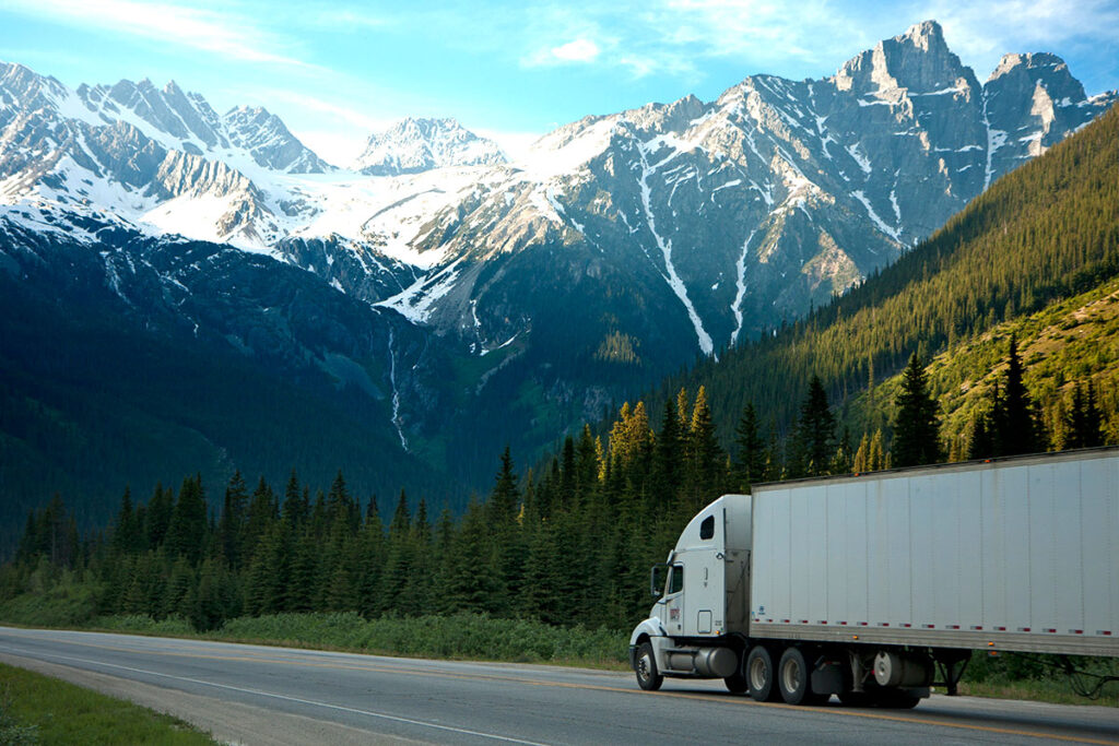 Semi-Trailer Truck driving through the mountains